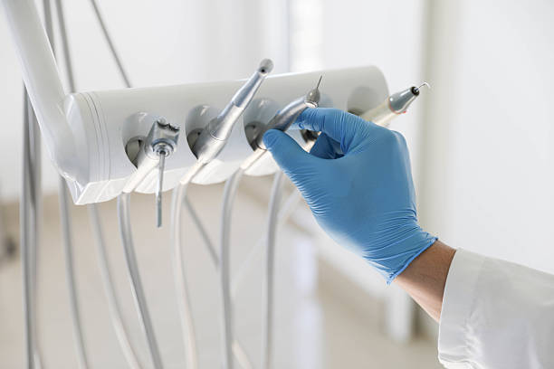 Professional Dental Implants technician working in King Cove, AK